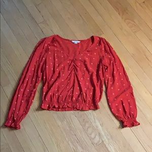 Coral blouse with white little flowers